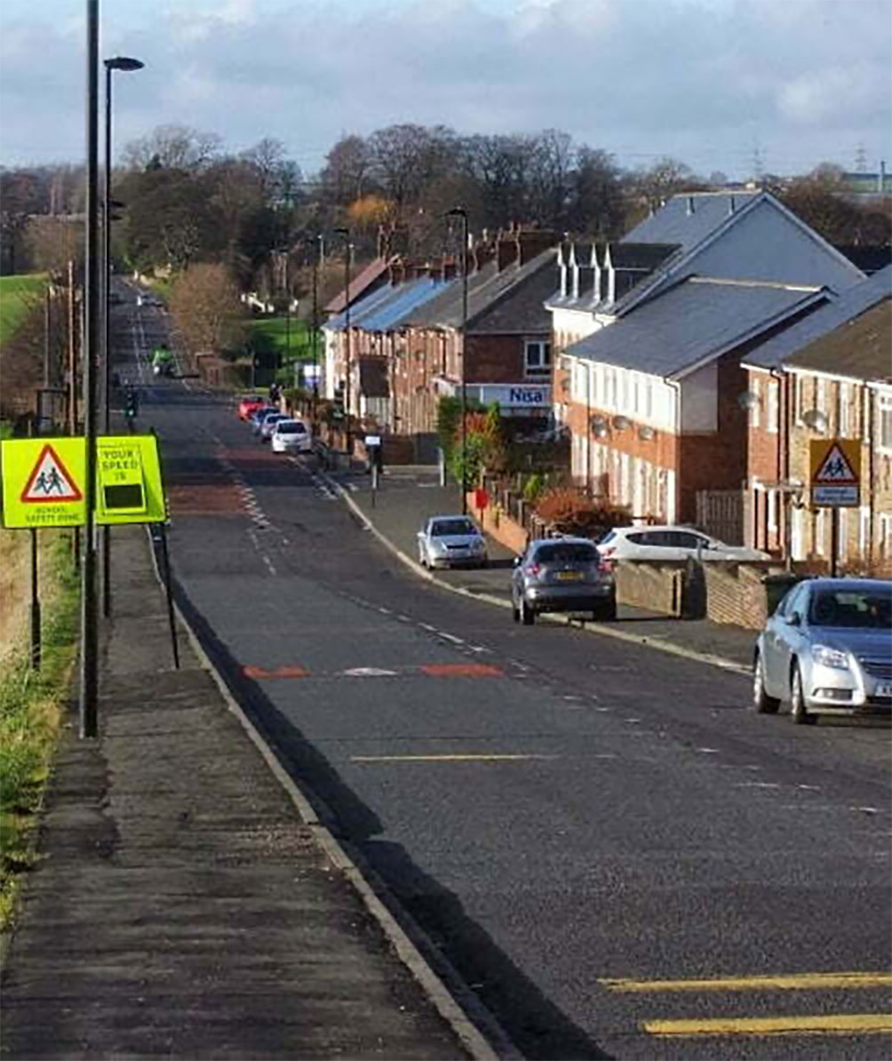 A view of Hexham Road running through Walbottle