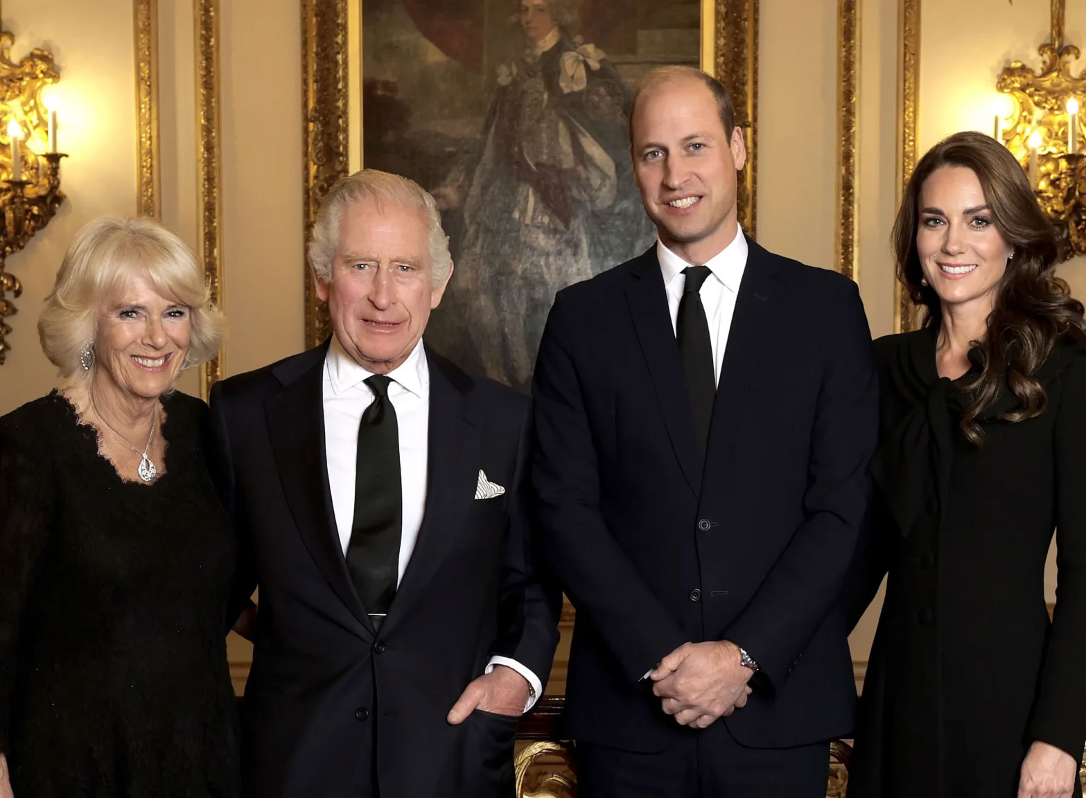photograph of King Charles III, Queen Camilla, and the Prince and Princess of Wales, William and Catherine